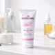 Kozicare cream tube placed in a clean clinical skincare setting with neutral background