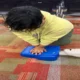 Person performing CPR chest compressions during CPR training.